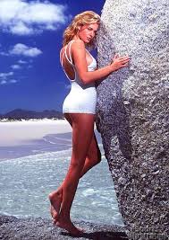 Rebecca Romijn primo film:  Sports Illustrated 1996 Swimsuit Video