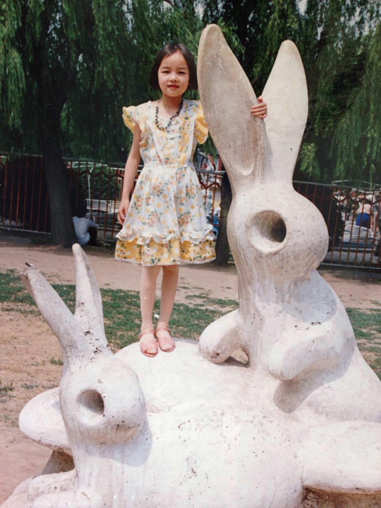 Fei Fei Sun, foto de infância um em Vogue.com